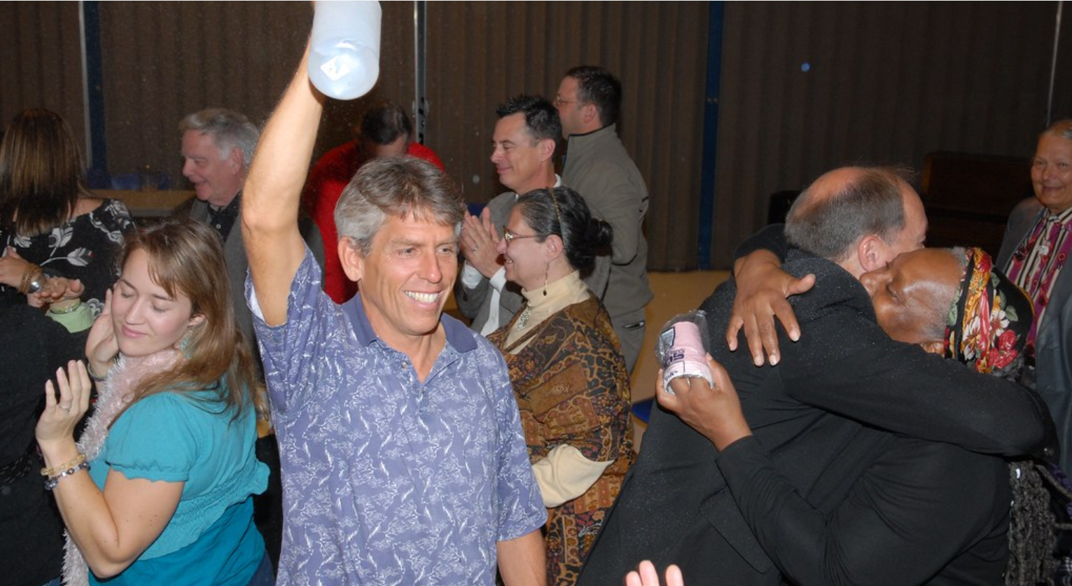 Joe leading a joyful water ceremony in Chicago
